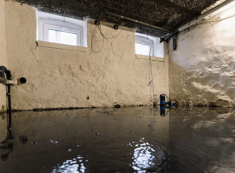 flood on a beige walled house with a brown ceiling